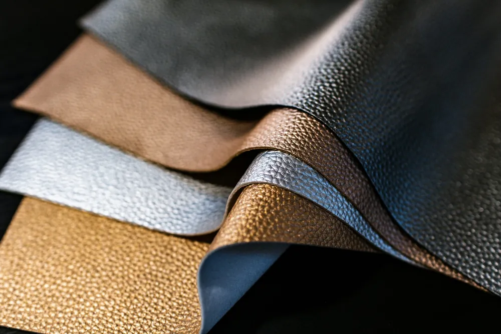 A fan of material swatches in varied colors and textures